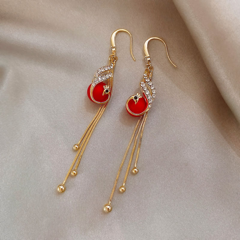 Festive Earrings with Blue Pearls