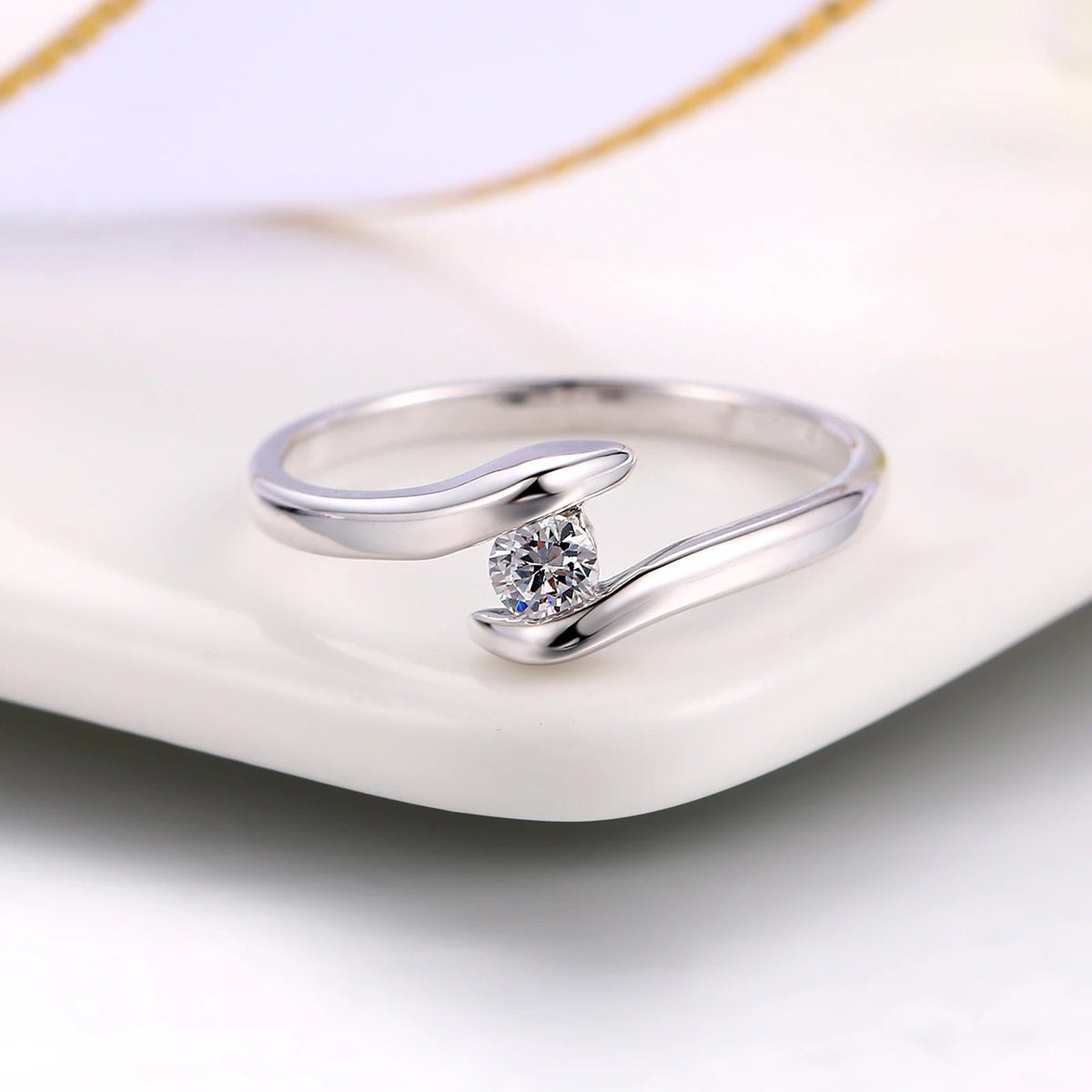 Silver Curved Band & Brilliant Center Diamond Ring